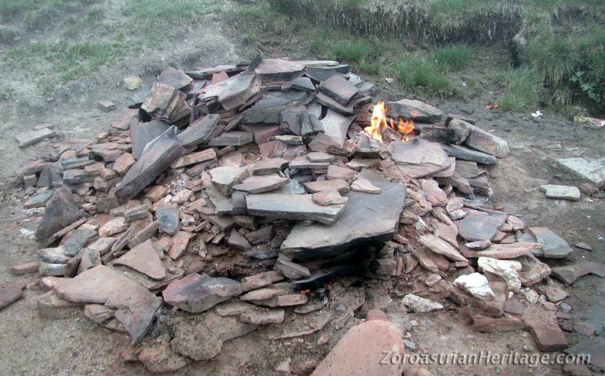 The Khinalig Atashgah's fire surrounded by slate shards on the slopes of Qizil/Gizil Gaya (Golden Rock)